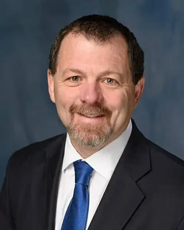 Glenn  E Smith